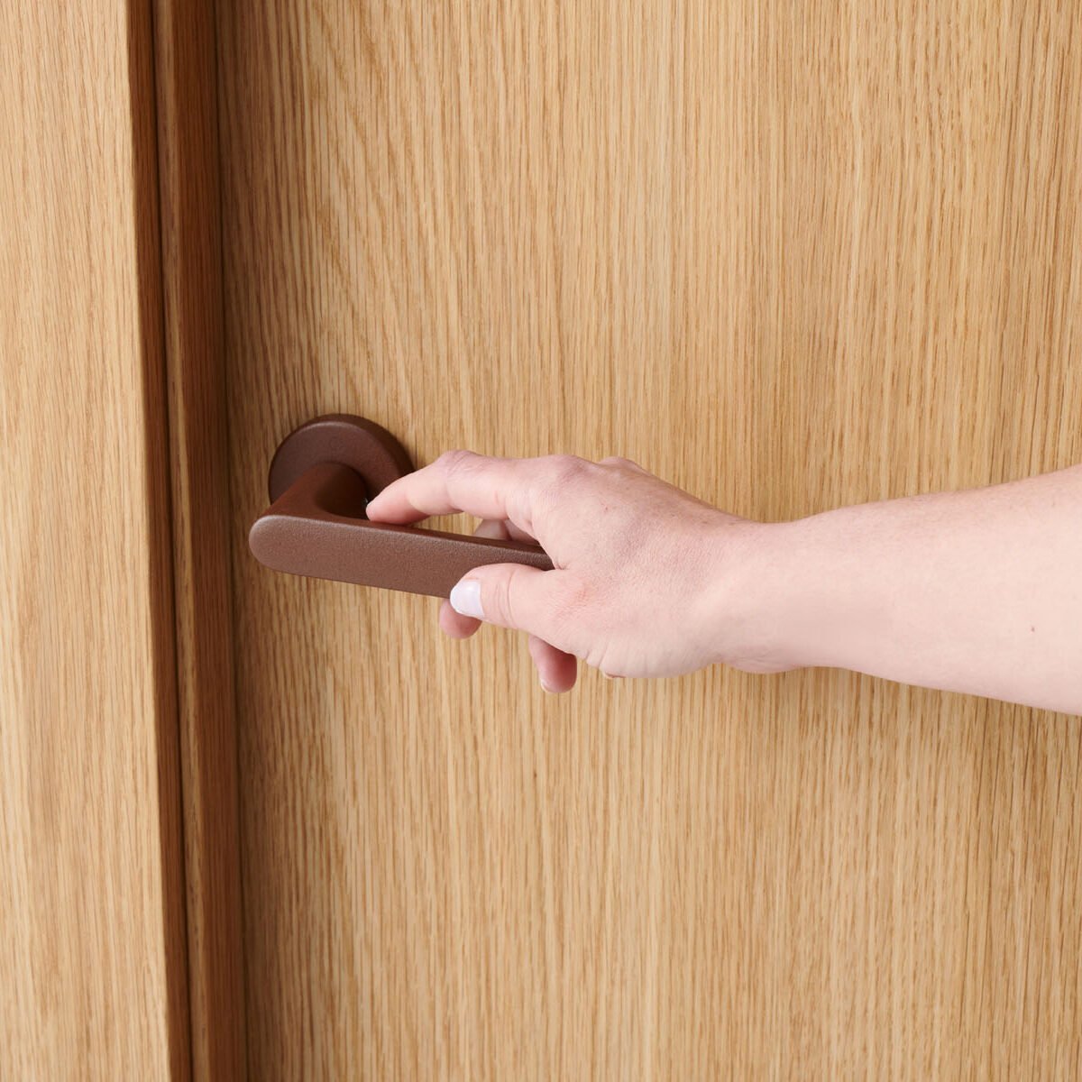 Hoja Roble Pure con manivela Hoppe Óxido texturizado