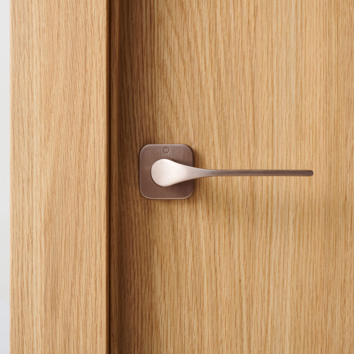 Hoja Roble Pure con manivela Hoppe Cobre Satinado