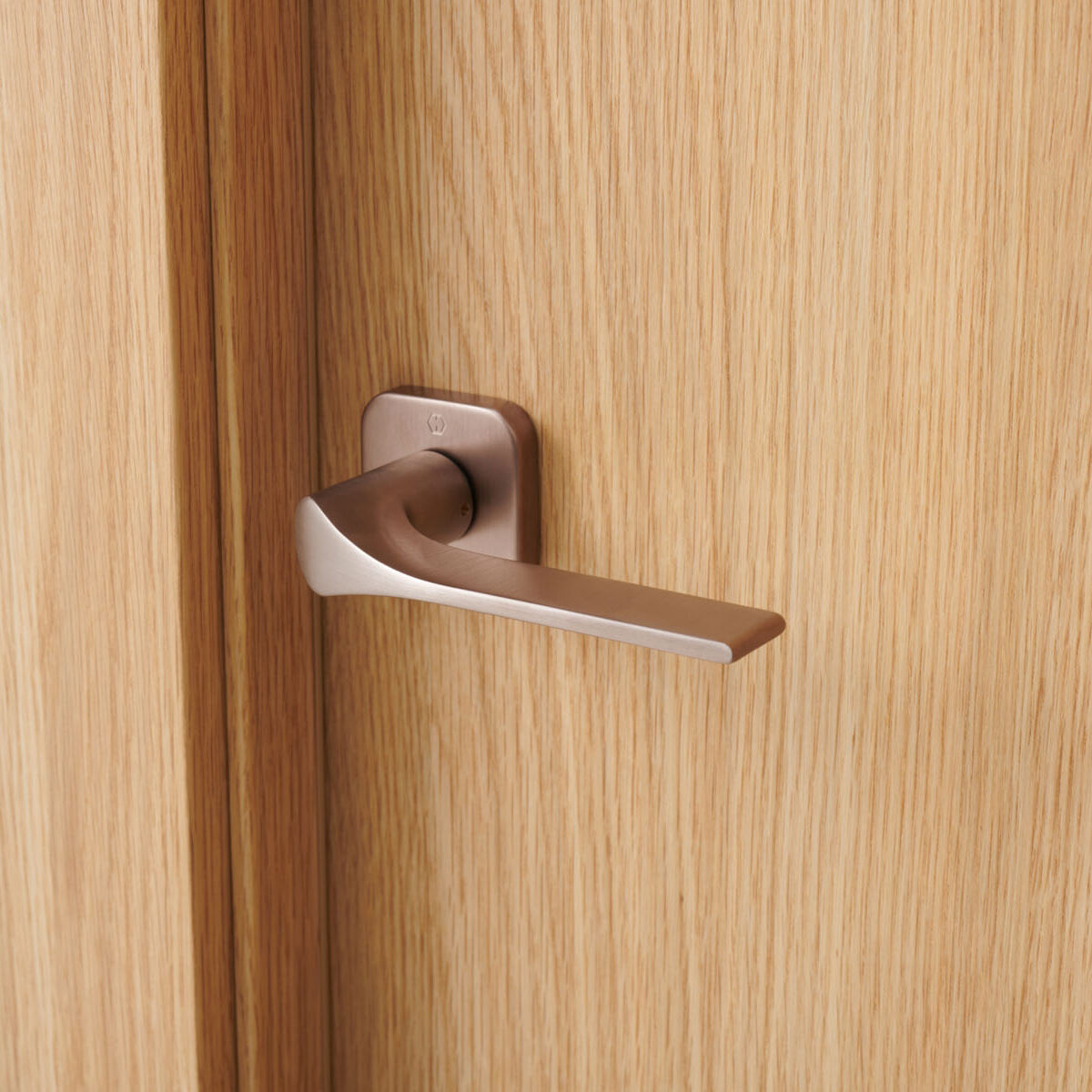 Hoja Roble Pure con manivela Hoppe Cobre Satinado