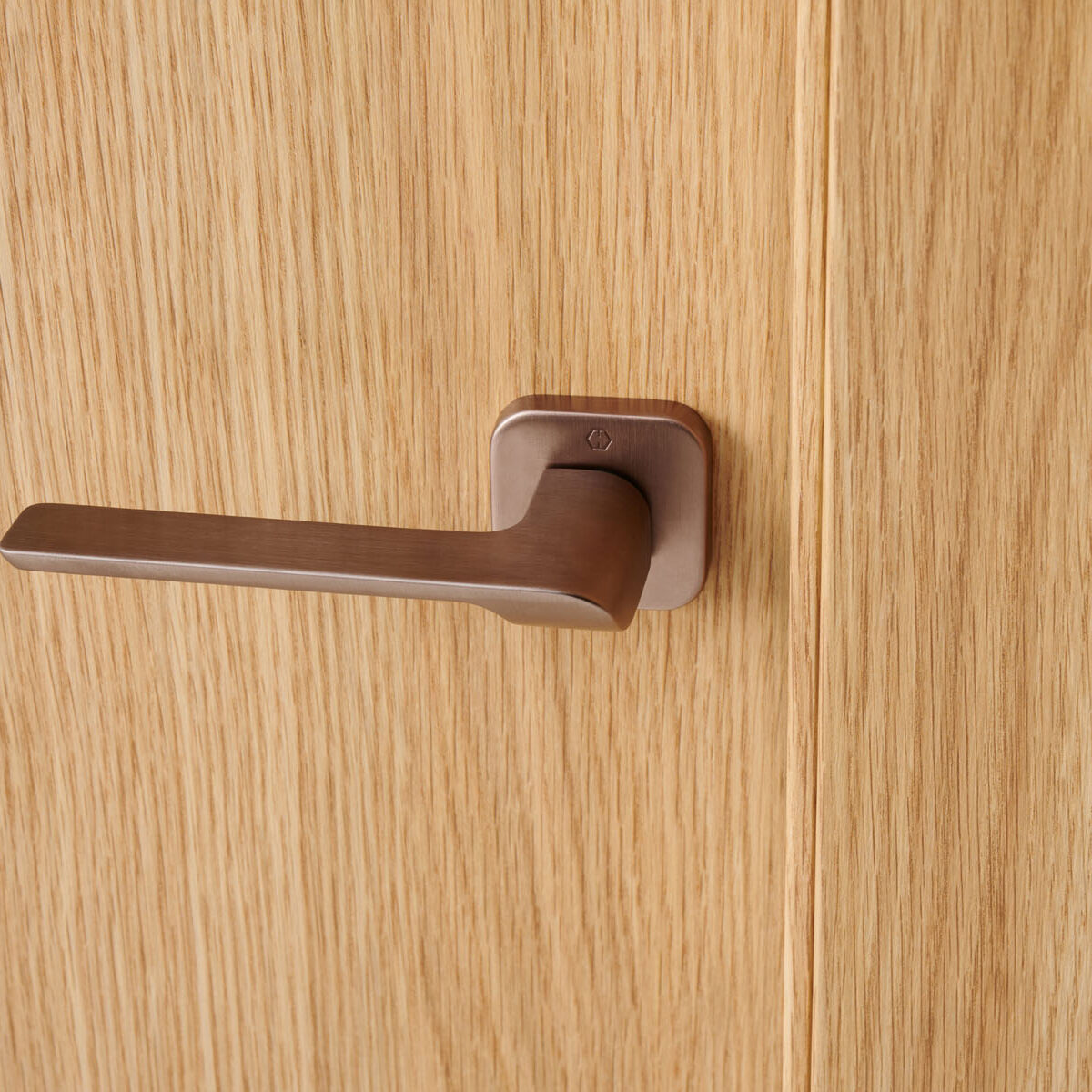 Hoja Roble Pure con manivela Hoppe Cobre Satinado